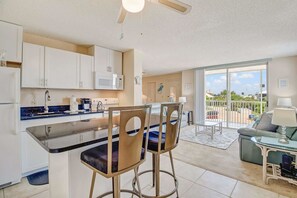Studio, 1 King Bed (Beach & Tennis 2303) | Private kitchen | Fridge, microwave, stovetop, dishwasher