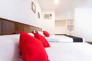 Standard Room, 2 Queen Beds, Pool View | Iron/ironing board, bed sheets - Hotel Las Garzas (Progreso)