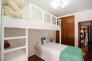 3 bedrooms, desk, iron/ironing board, travel cot