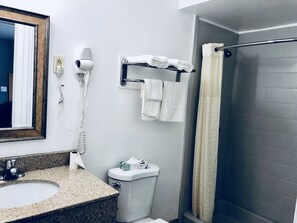 Deluxe Single Room, 1 King Bed, Non Smoking | Bathroom | Free toiletries, hair dryer, towels, soap