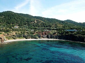 A la platja, gandules de platja i tovalloles de platja