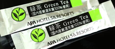 Two packages of green tea from APA Hotels & Resorts.