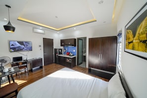 Basic Studio | Memory foam beds, desk, laptop workspace, blackout drapes