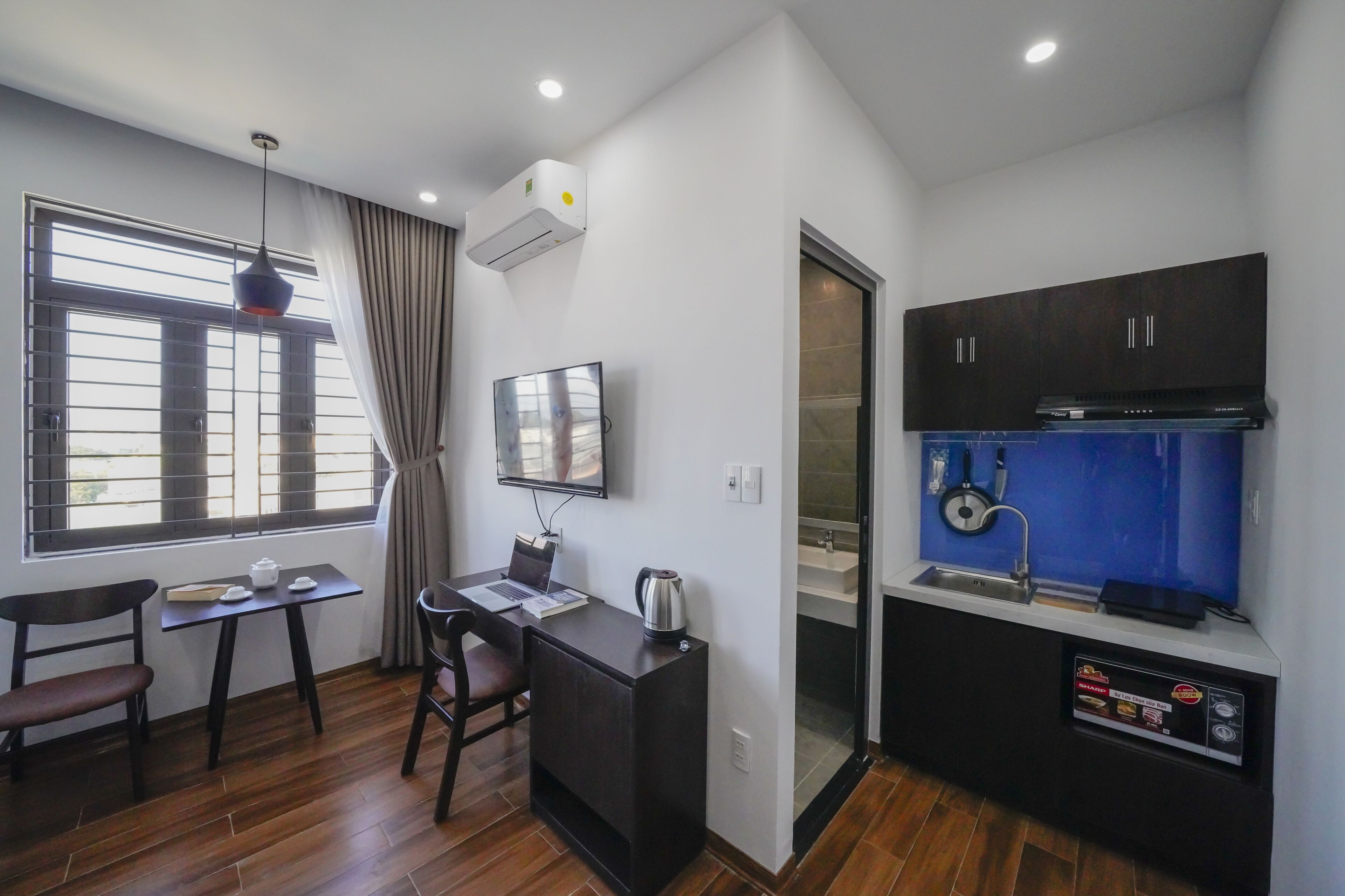 Superior Studio | Memory foam beds, desk, laptop workspace, blackout drapes