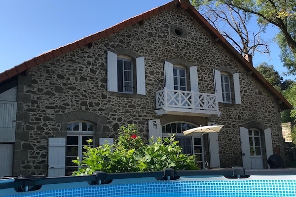 The pool is set right next to the house!