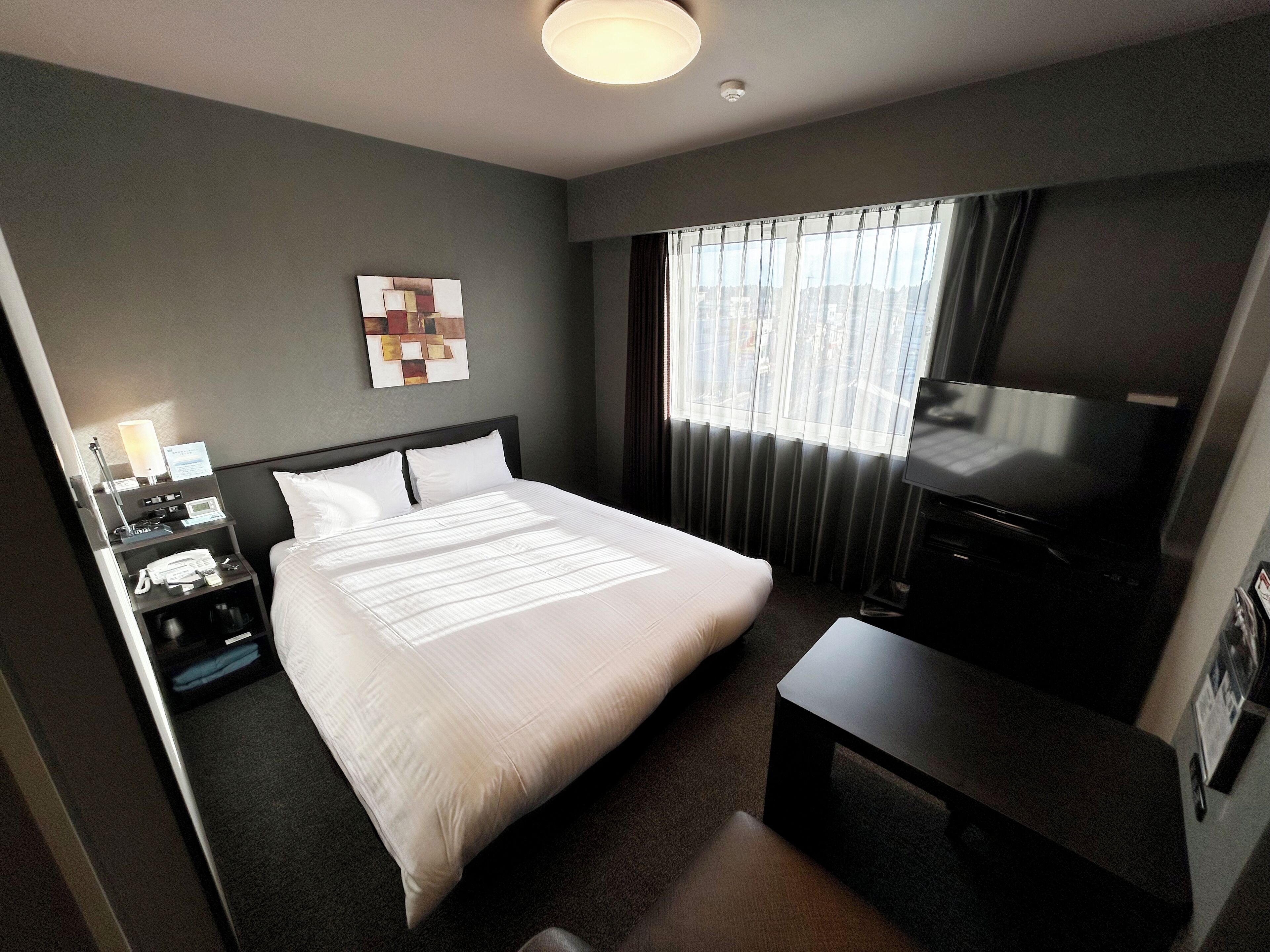 Kamar Double Comfort, Bebas Asap Rokok | Meja kerja, Wi-Fi gratis, dan seprai linen