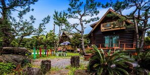 Front of property - Log Village Pension Jeju (Seogwipo)