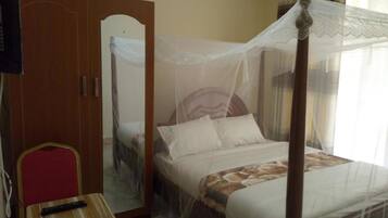 Desk, laptop workspace, free WiFi, bed sheets