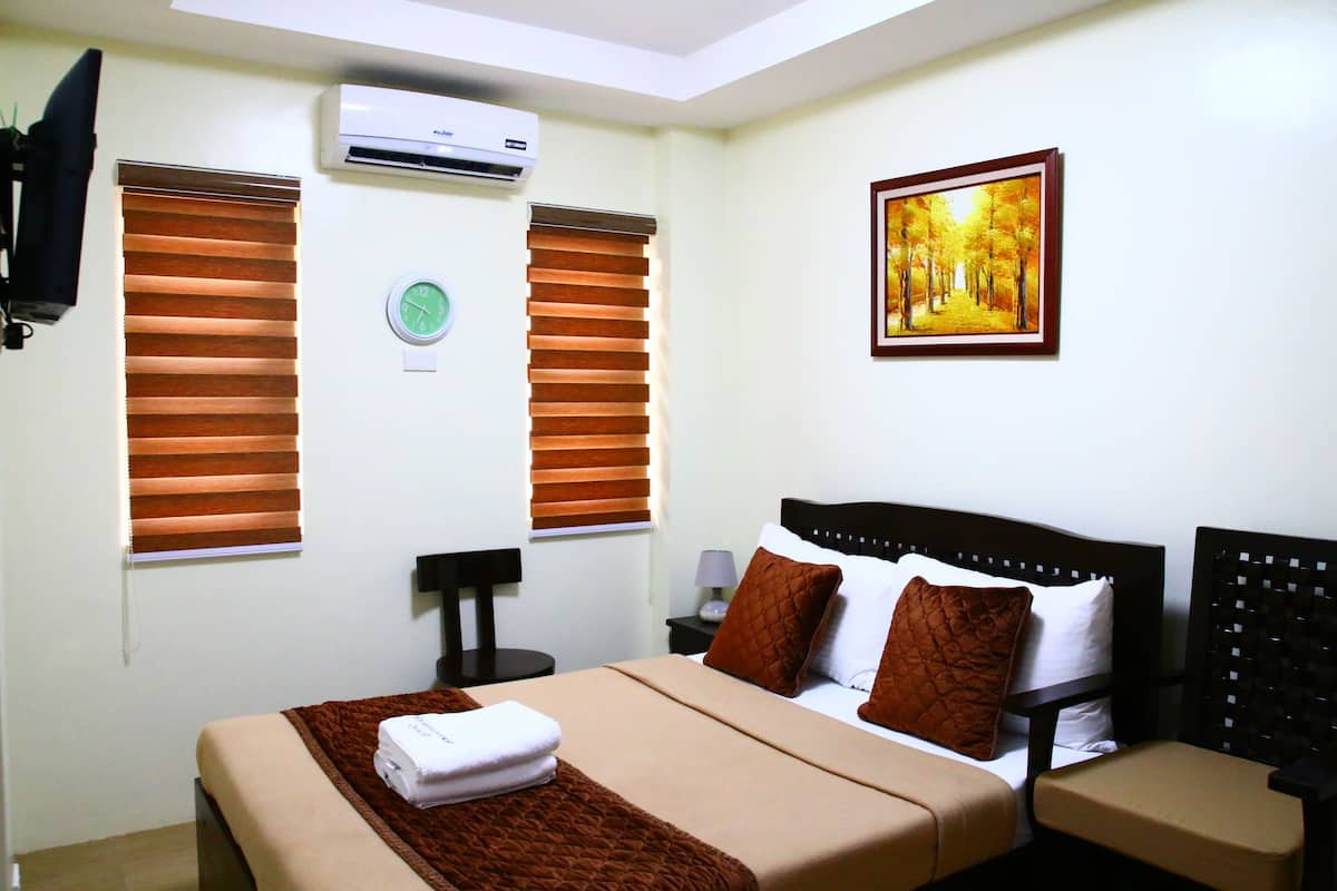Quarto standard | Wi-Fi de cortesia, roupa de cama
