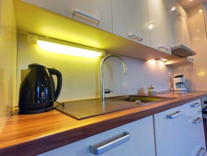 Apartment, 2 Bedrooms | Private kitchen | Fridge, microwave, oven, stovetop