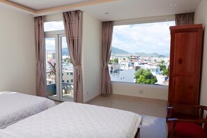 Quadruple Room | Desk, free WiFi - OYO 587 Trang Long (Nha Trang)