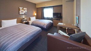 A hotel room with two beds, a desk, a chair, a TV, and a large mirror. - Hotel Route-Inn Kashiwa Minami - Kokudo 16 gou zoi (Kashiwa)