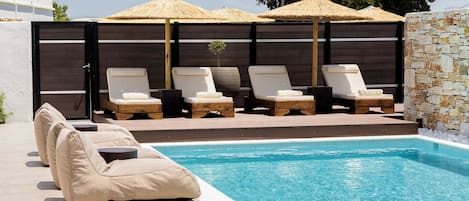Seasonal outdoor pool, pool umbrellas, sun loungers