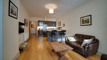 Deluxe Apartment, 1 Bedroom | Living area | Smart TV