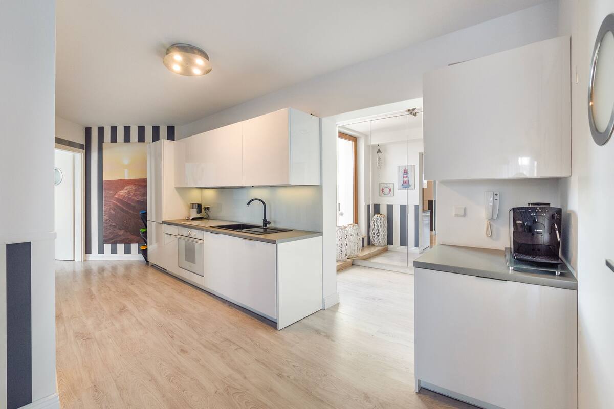 Apartemen, pemandangan laut (B36) | Dapur kecil pribadi | Lemari es, kompor, dan peralatan masak/sendok-piring