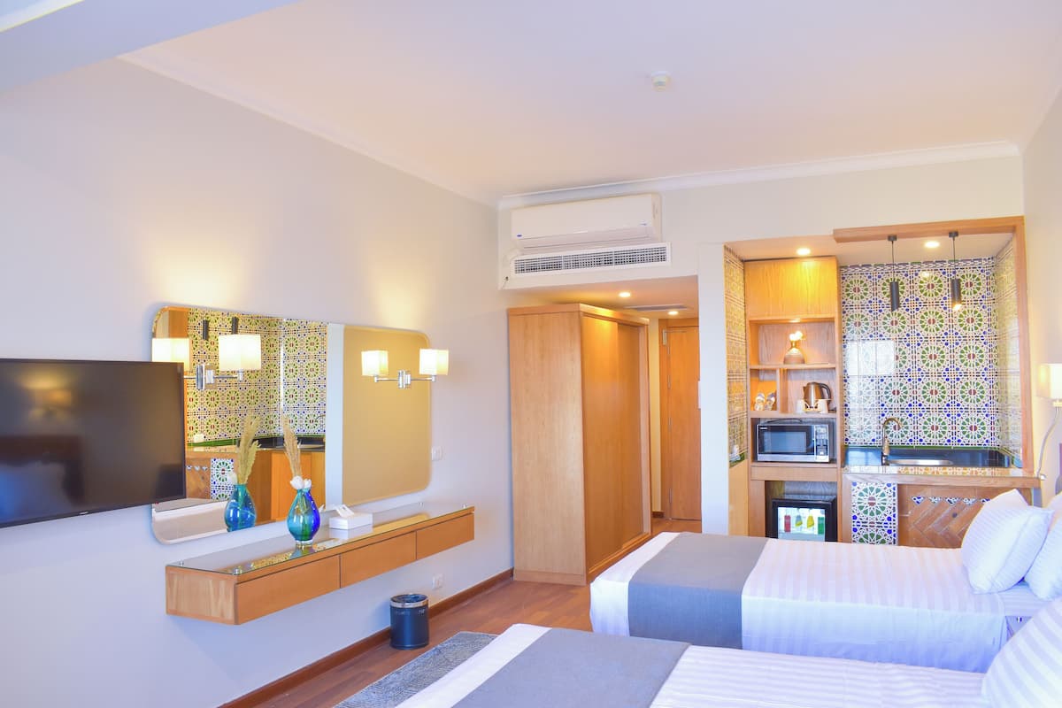 Ropa de cama de alta calidad y minibar