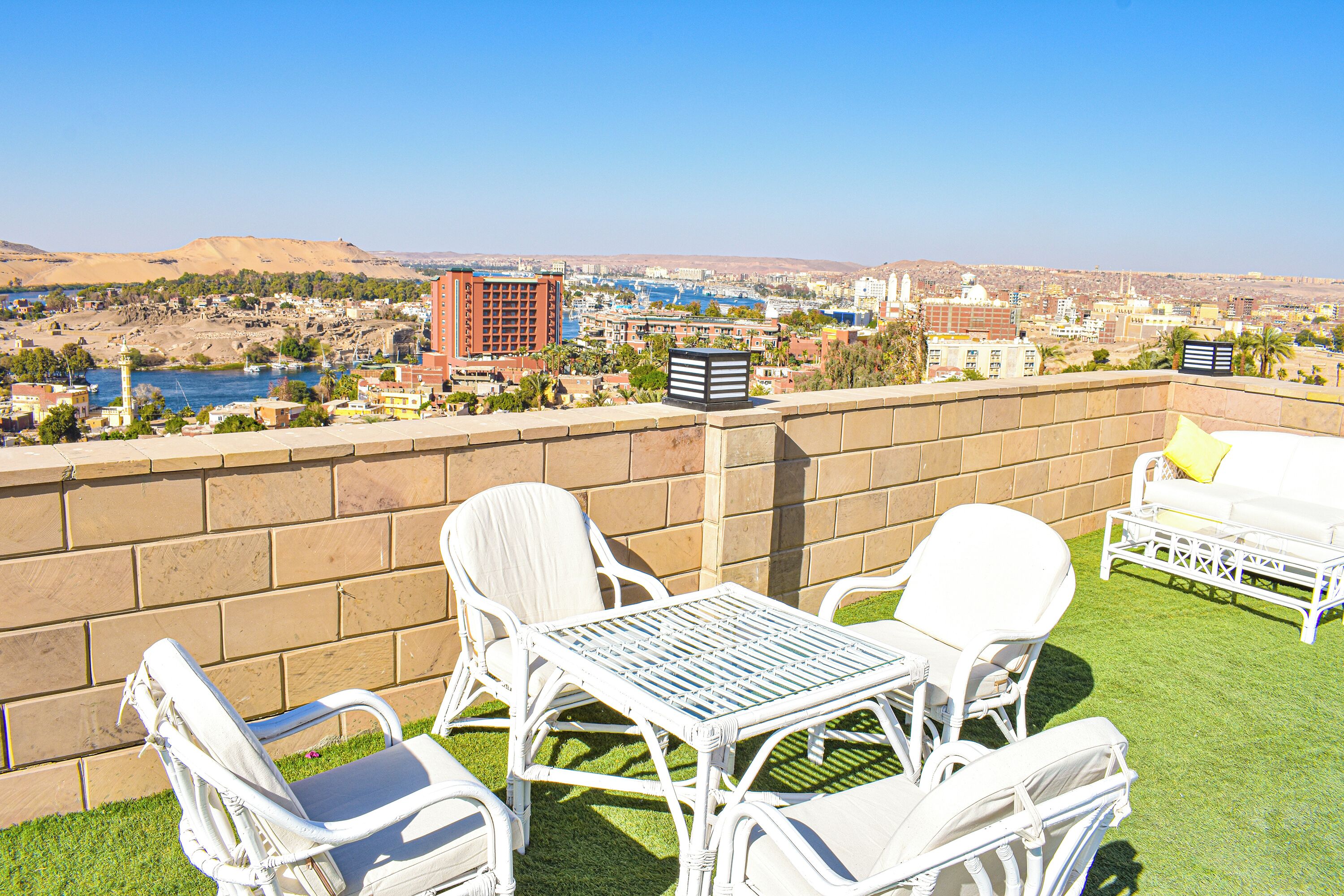 outdoor pool, open 6:00 am to 5:00 pm, pool umbrellas, pool loungers