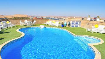 Outdoor pool, open 6:00 AM to 5:00 PM, pool umbrellas, sun loungers