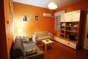 Appartement, 1 chambre | Coin séjour | Télévision à écran plat