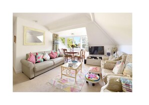 Deluxe Townhome, 4 Bedrooms | Living area | Flat-screen TV, toys - Discoveries House (Bournemouth)