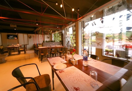 Breakfast, lunch, dinner and brunch served. WithInn Hotel - Kannur Airport
