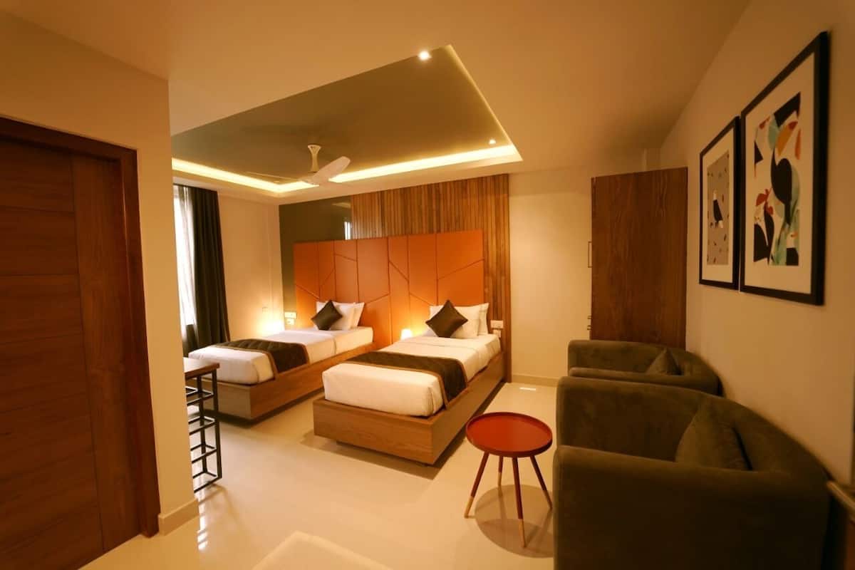 Chambre Deluxe Double ou avec lits jumeaux | Minibar, rideaux occultants, chambres insonorisées