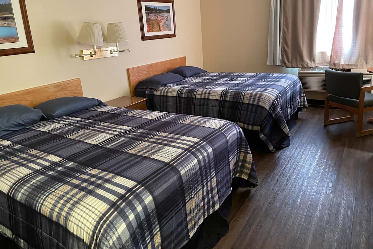Economy Room | Pillowtop beds, individually decorated, individually furnished