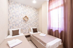 Apartemen | 1 kamar tidur, meja kerja, dan setrika/meja setrika