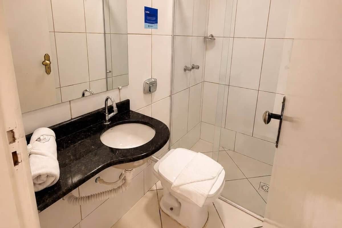 Shower, towels, soap, toilet paper