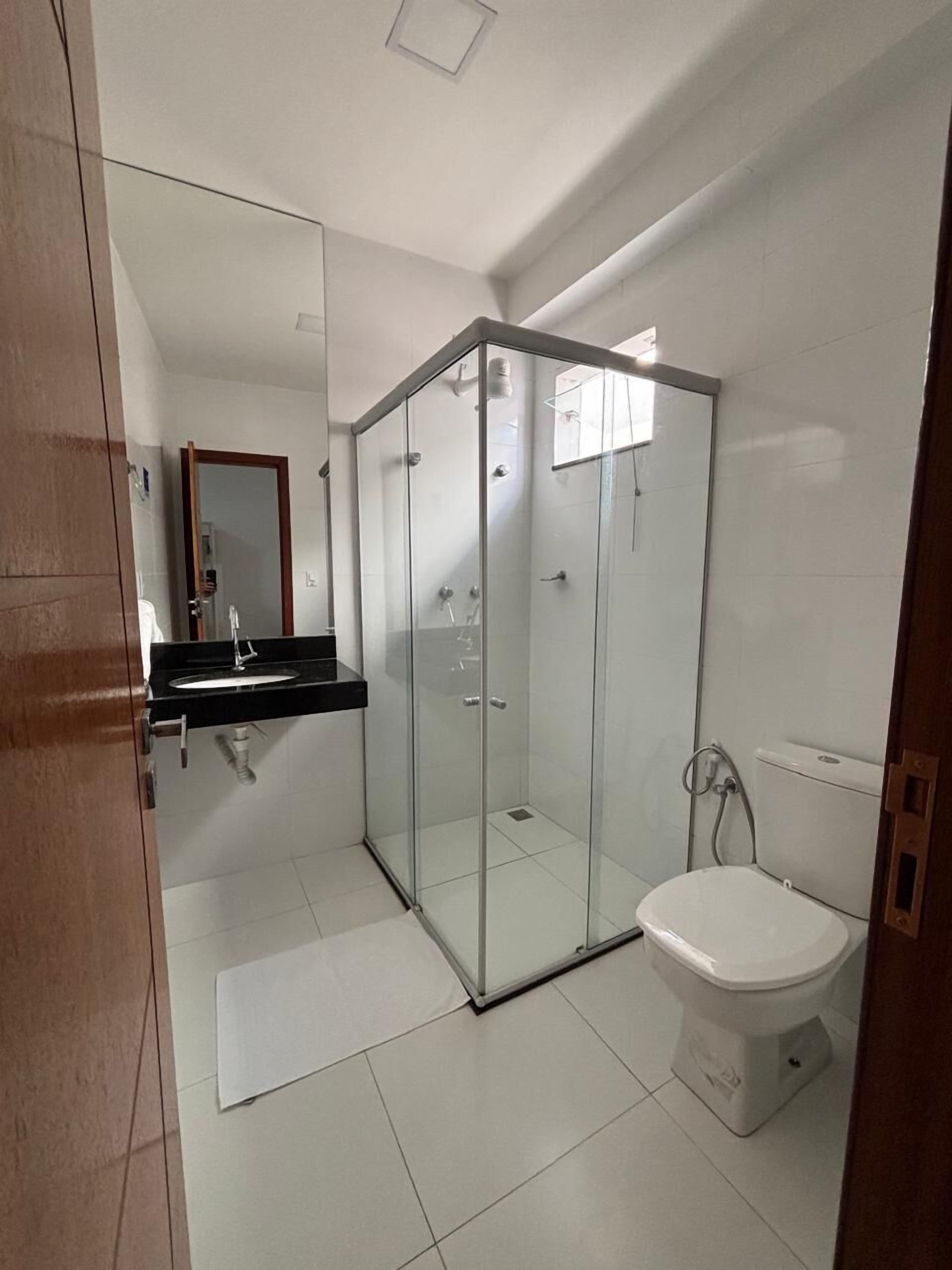Shower, towels, soap, toilet paper