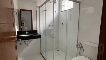 Shower, towels, soap, toilet paper