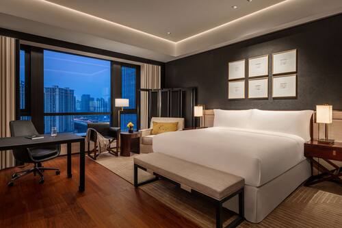 Premium bedding, down duvets, pillow-top beds, free minibar items