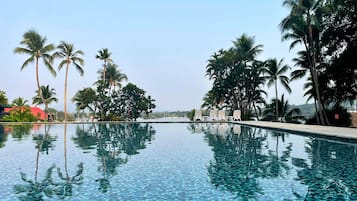 Outdoor pool, open 8:00 AM to 8:00 PM, sun loungers