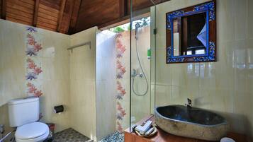 Shower, slippers, bidet, towels