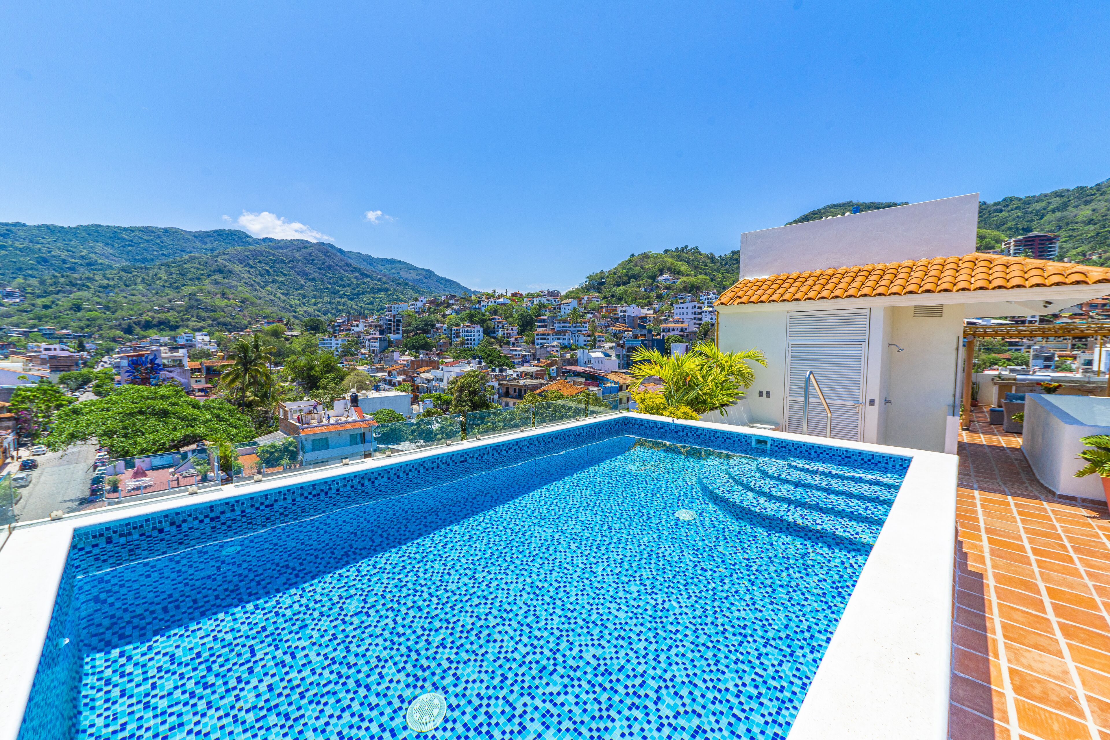 Outdoor pool, open 7:00 AM to 10:00 PM, pool umbrellas, sun loungers