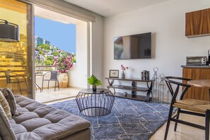 Télévision à écran plat de 55 pouces avec chaînes par câble