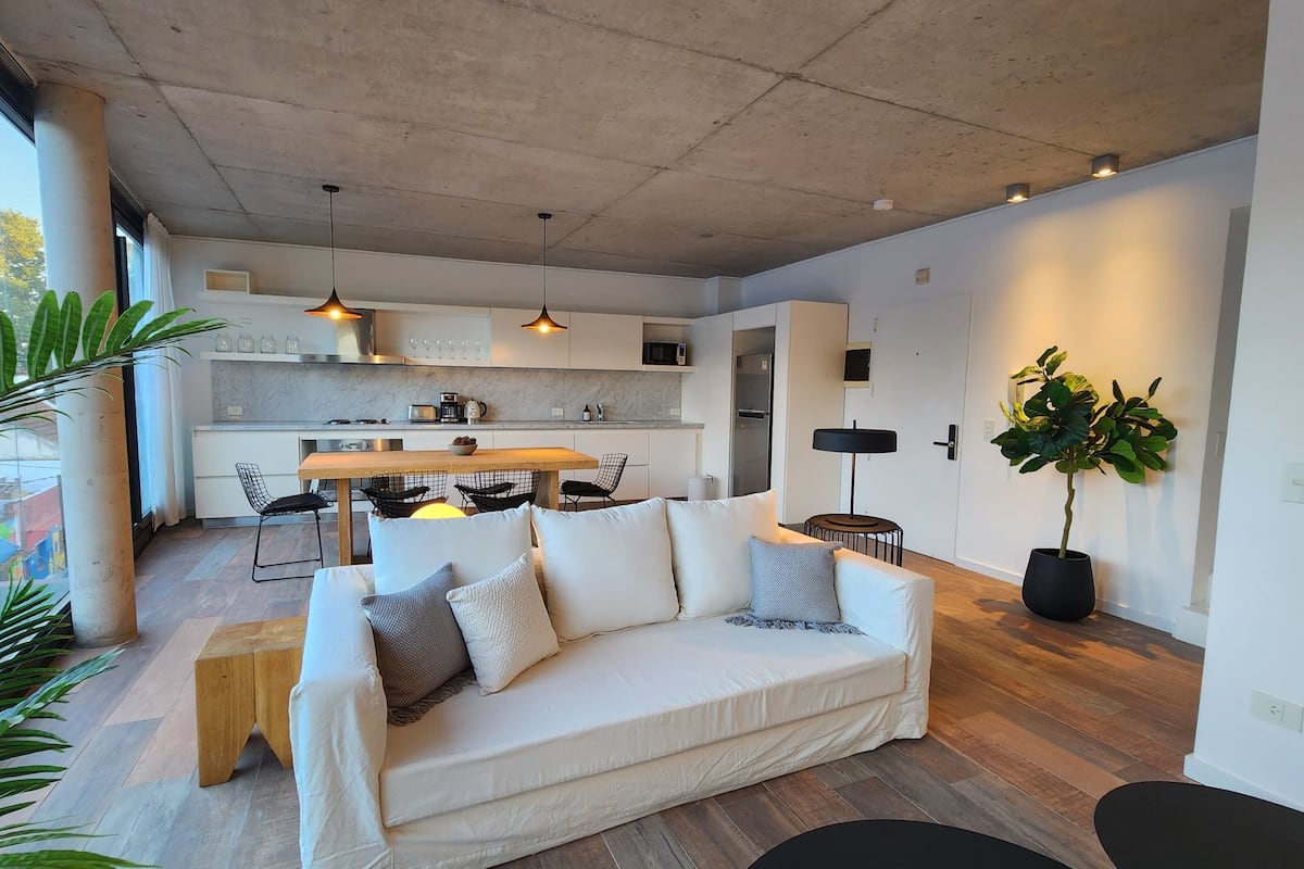 Duplex | Living area | 60-inch Smart TV with cable channels