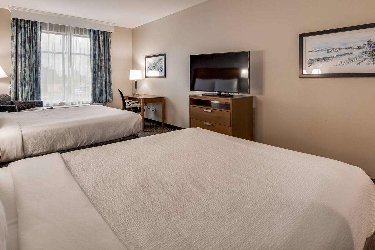 desk, laptop workspace, blackout curtains, iron/ironing board