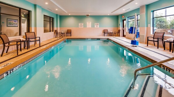 Indoor pool, open 10:00 AM to 10:00 PM, pool loungers