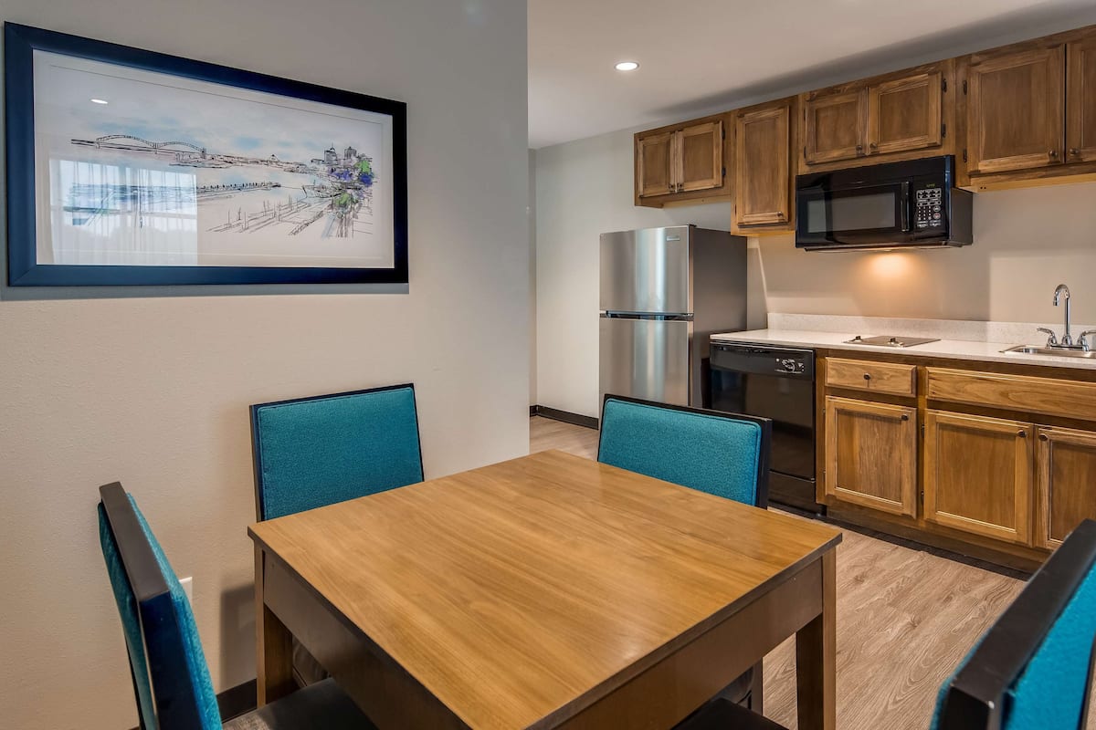 desk, laptop workspace, blackout curtains, iron/ironing board