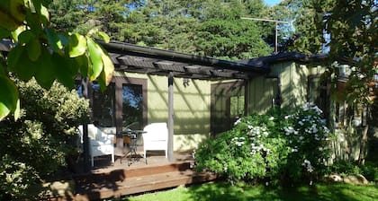 Acogedora casa de huéspedes en un impresionante jardín