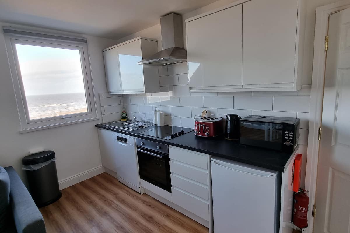 10 Apartment with Sea View: Loft Type 3rd Floor (plus 1 free baby) | Privékeuken | Een koelkast, een magnetron, een oven, een kookplaat