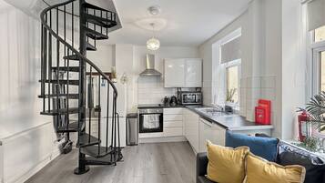 06 Apartment Maisonette | Living area | 55-inch flat-screen TV with digital channels, Smart TV, Netflix