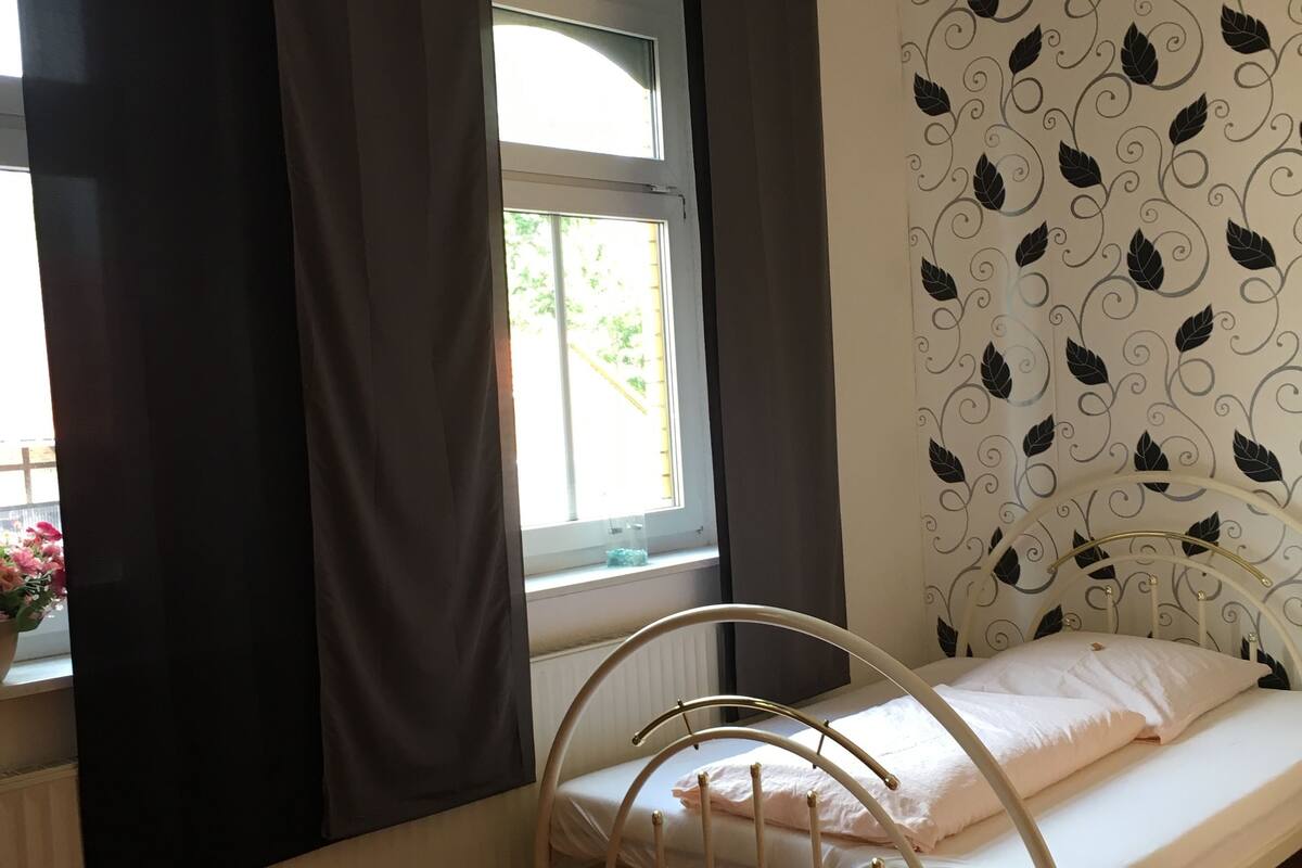 Desk, blackout drapes, soundproofing, WiFi (free)