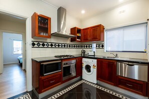 City Apartment | Private kitchen | Full-size fridge, microwave, oven, stovetop - Lighthouse Cozy 2BDR with CITY VIEWS (Middle Park)