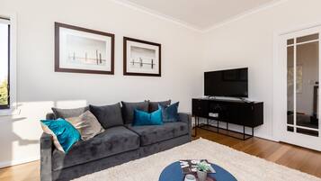 City Apartment | Living area | Smart TV