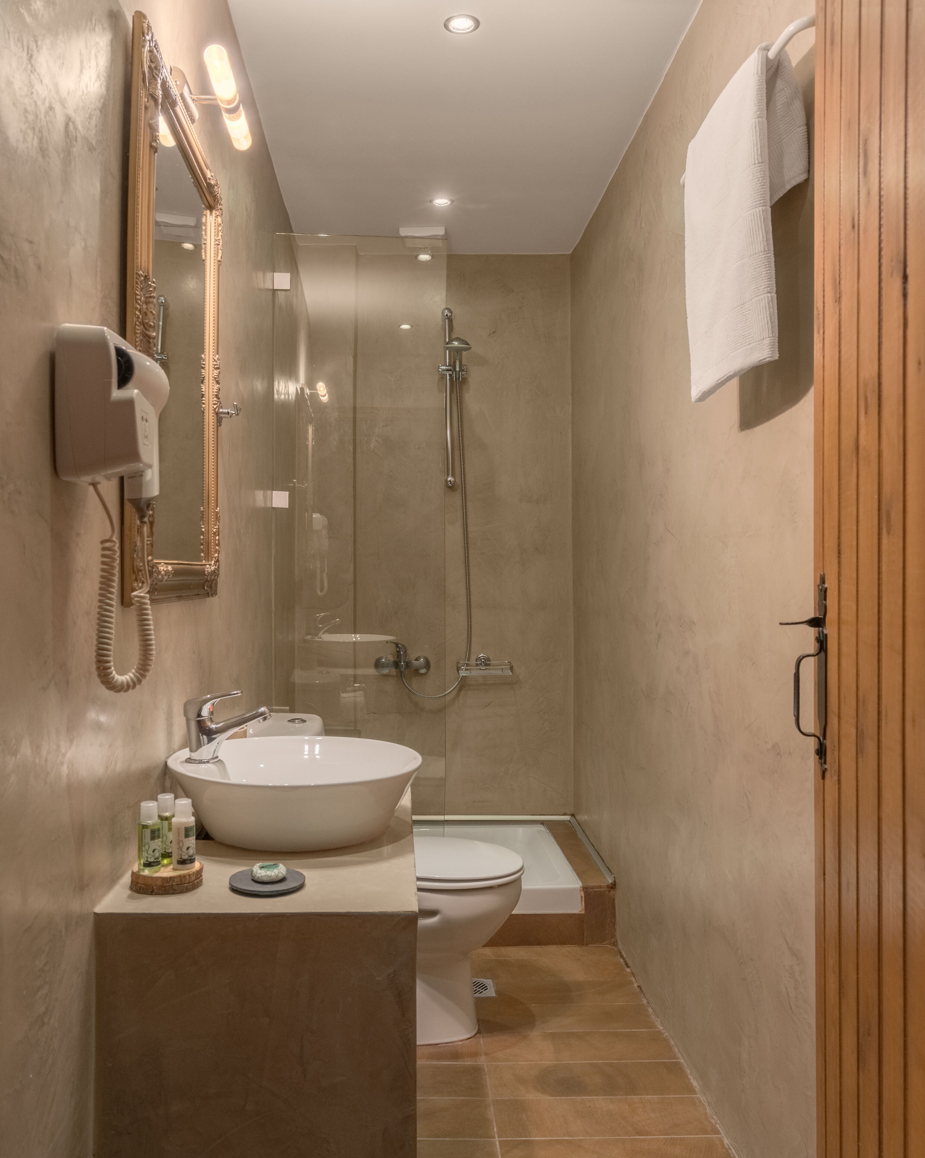 deluxe double room, balcony, mountain view | bathroom | designer toiletries, hair dryer, slippers, towels