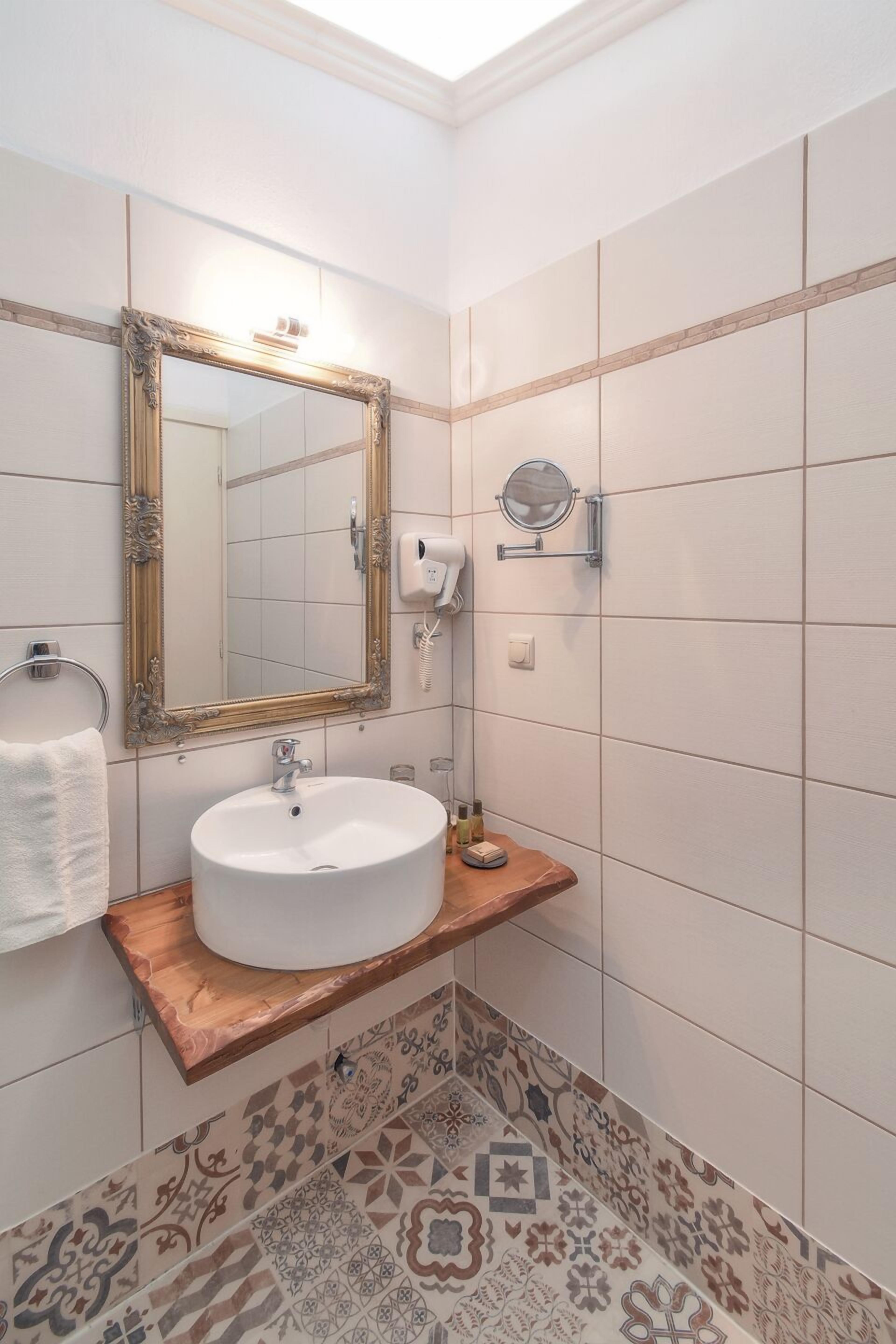 superior double room | bathroom | designer toiletries, hair dryer, slippers, towels