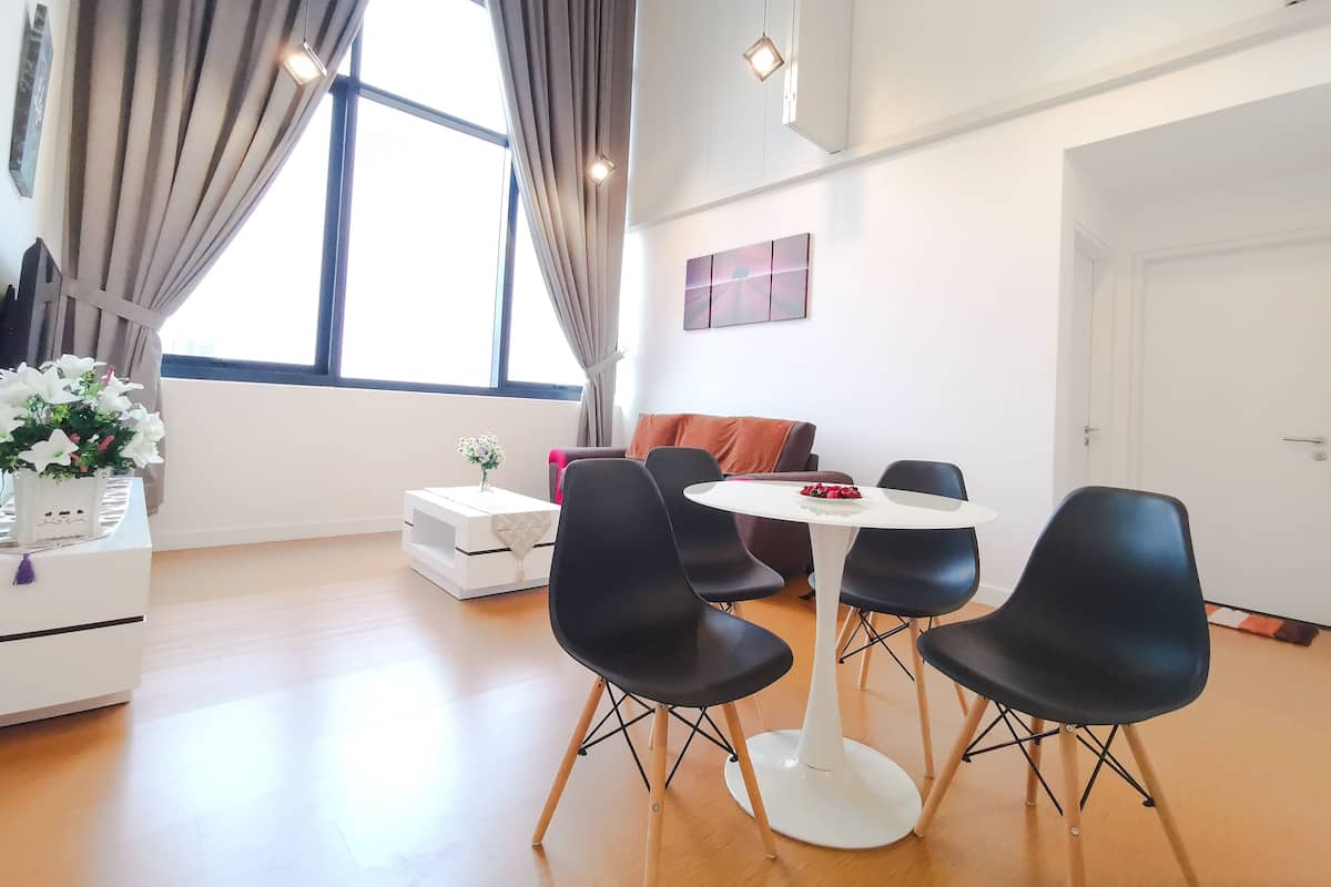 Apartment, 2 Bedrooms (The Eton) | Living room | Flat-screen TV