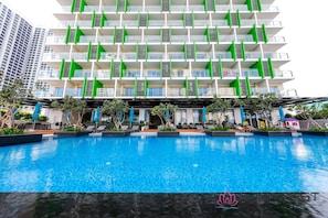 Outdoor pool, open 8:00 AM to 8:00 PM, pool umbrellas, pool loungers